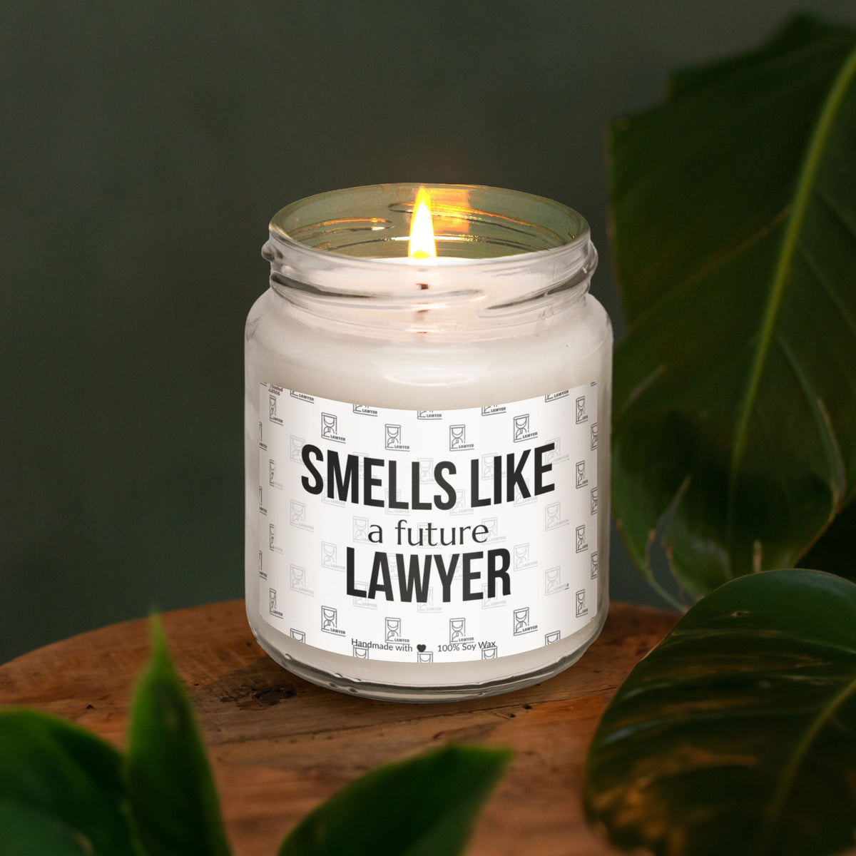 a candle sitting on top of a wooden table