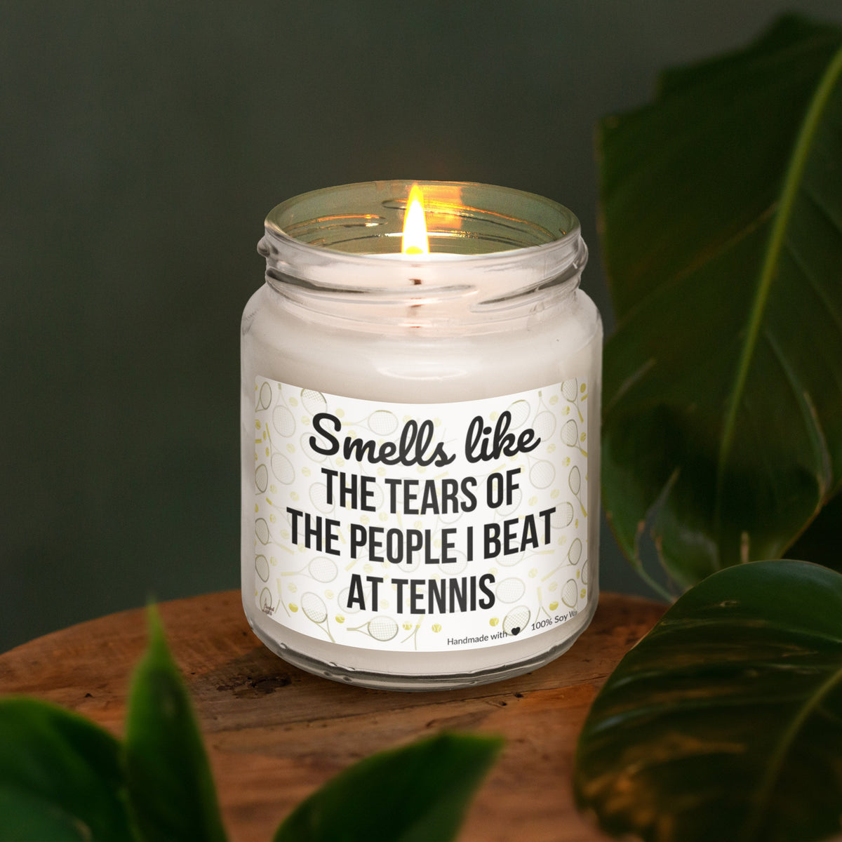 a candle that reads smell like the tears of the people i beat at tennis